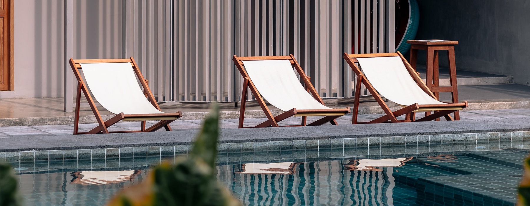 pool with lounge chairs